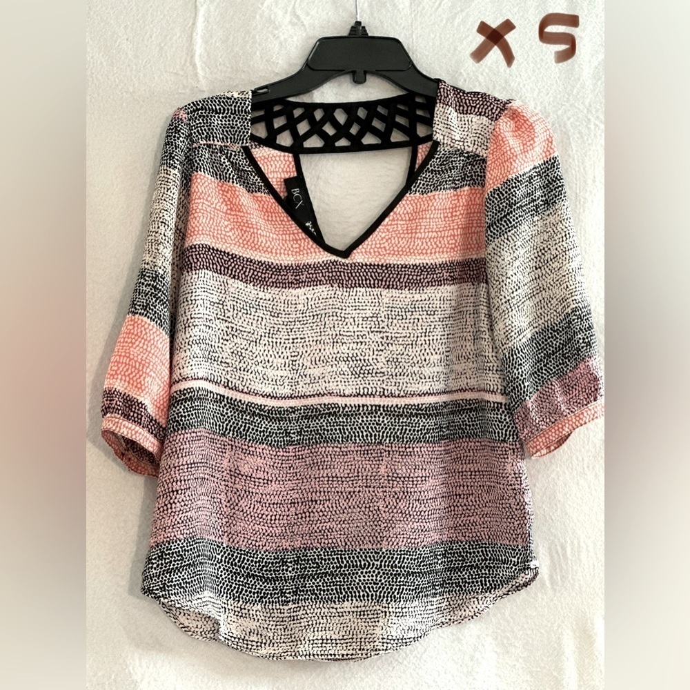 LADIES WHITE TOP WITH BLACK, PINK & MAUVE POLKA DOTS